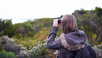 Buy stock photo Woman, binoculars and hiking for mountain view on trekking path for exploring, adventure or journey. Female person, backpacking and traveling workout for wilderness fitness, vacation or environment