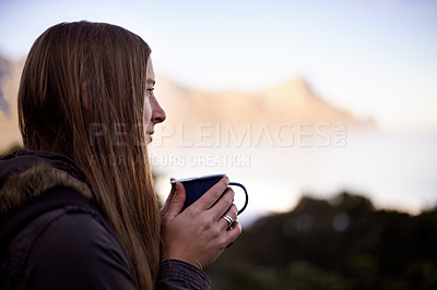 Buy stock photo Shot of an attractive young woman enjoying a hot drink while on a hike