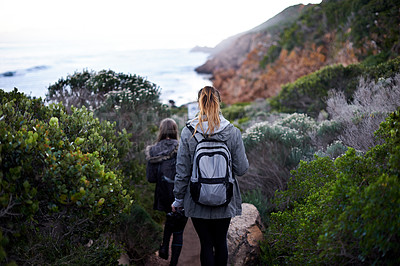 Buy stock photo Women, friends and hiking mountain or adventure environment for holiday vacation, trekking or backpacking. Female people, back and explore walking for healthy training or outdoor, exercise or bush