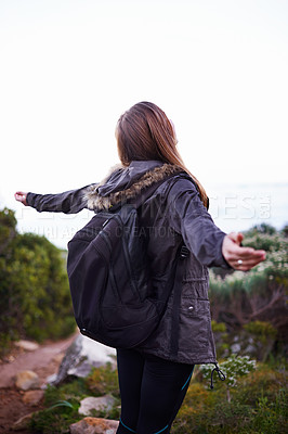 Buy stock photo Woman, hiking and celebration of mountain view for nature adventure for backpacking journey, travel or vacation. Female person, back and foliage for training trekking or exercise, freedom or fitness