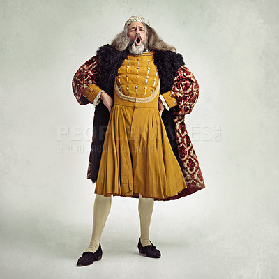Buy stock photo Studio shot of a richly-garbed king singing