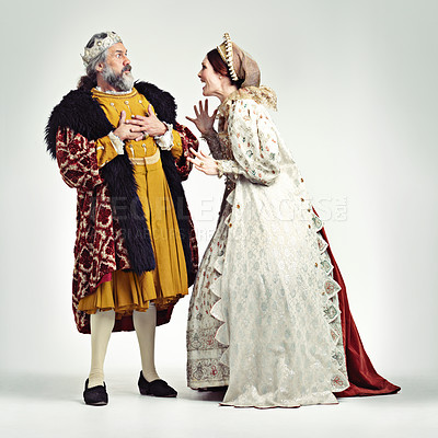 Buy stock photo Argue, medieval and king with queen on a white background for argument, anger and frustrated fight. History, theatre and royal couple in vintage, renaissance and history cosplay isolated in studio