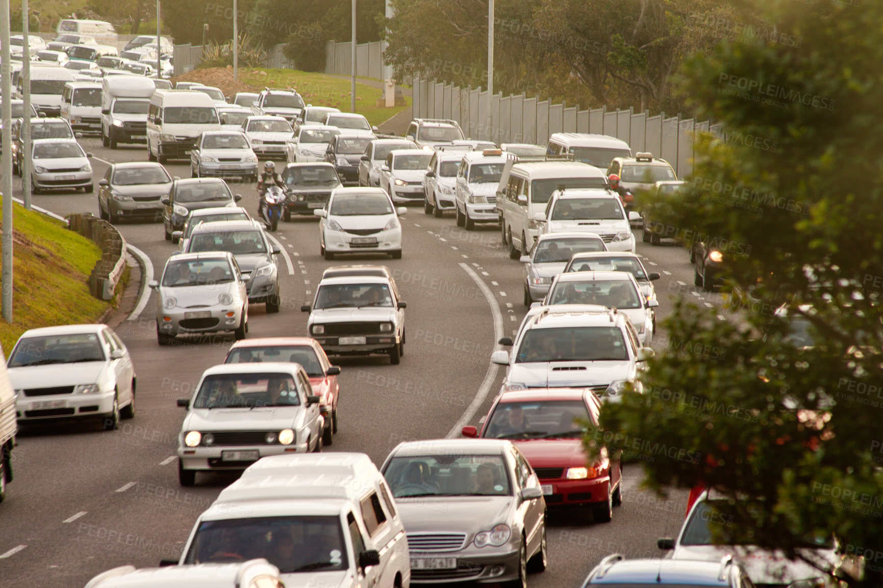 Buy stock photo Shot of a cars traveling in heavy traffic on the way home from work