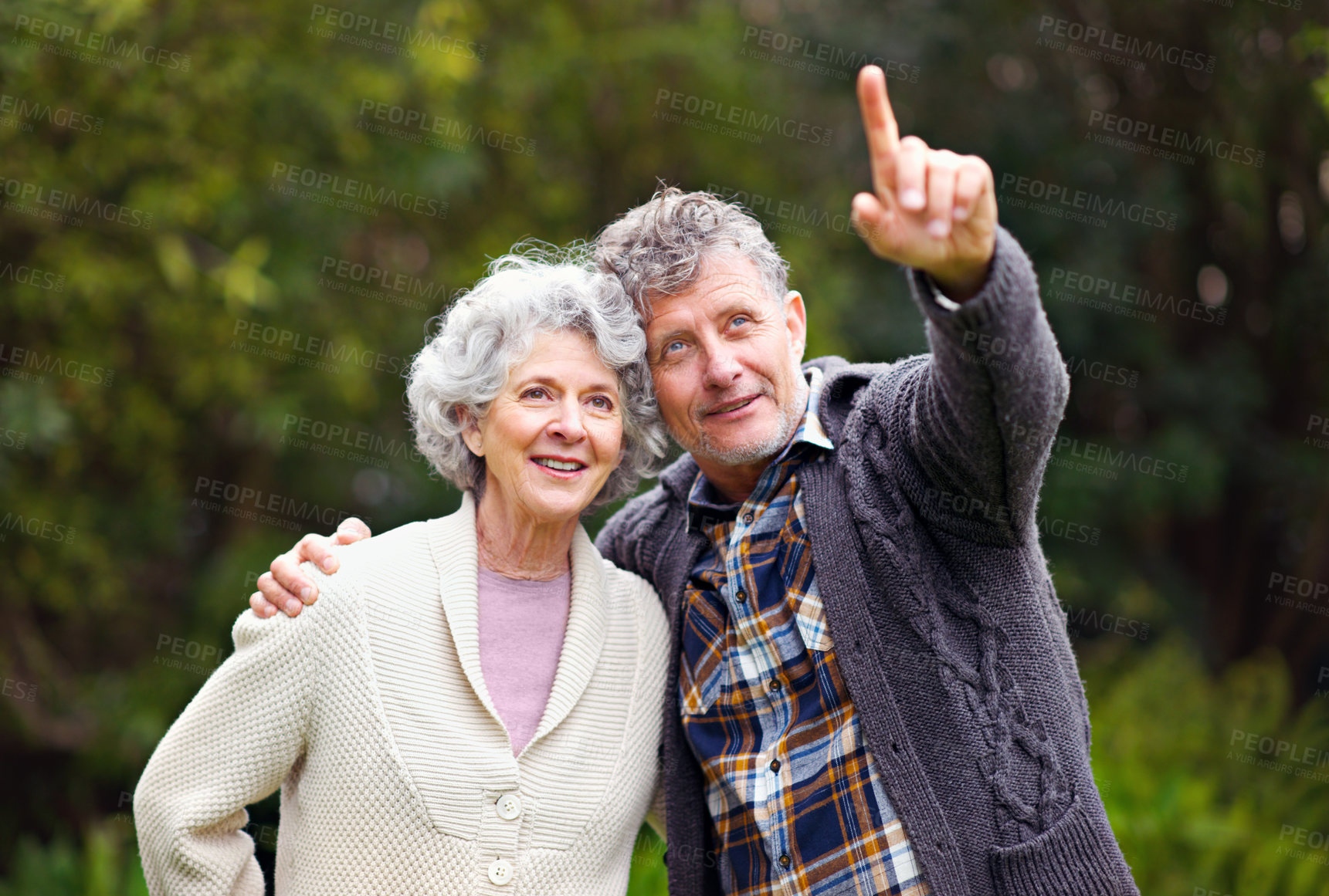 Buy stock photo Retired people, pointing or love to relax in garden by thinking, walking or planning happy holiday. Couple, vision or rest in nature park as conversation, happiness or memory of retirement dreams