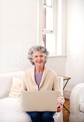Buy stock photo Laptop, sofa and portrait of elderly woman in living room for movie, weekend and enjoyment. Relax, smile and senior person with digital technology for happiness, streaming and retirement at home