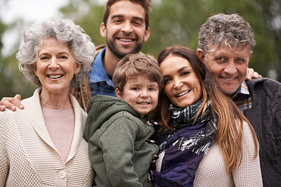 Buy stock photo Portrait of a happy multi-generation family standing outdoors