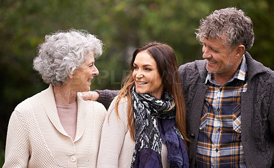 Buy stock photo Shot of a beautiful woman spending time with her senior parents