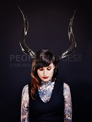 Buy stock photo Woman, horns and tattoo for costume, cosplay and creative with ink for design, picture and symbol. Young person and ears for art and bold for statement, funky and edgy or unique on dark background 
