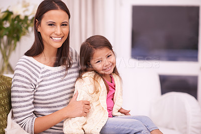 Buy stock photo Portrait, mother and relax girl with smile for embrace in living room with love, care and happiness. Apartment, mom and kid in lounge for rest on sofa or couch with hug for bonding in family house