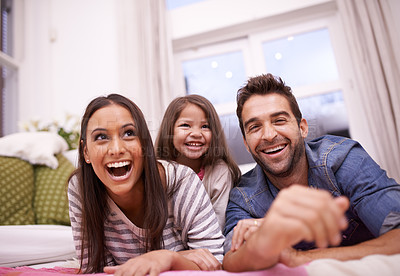 Buy stock photo Portrait of a happy young family at home