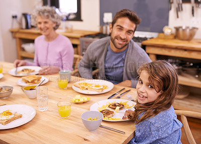 Buy stock photo Love, breakfast and family in portrait or kitchen with food, eating or bonding together at table. Meal, pancakes and father or grandmother with child for brunch, nutrition or communication at home