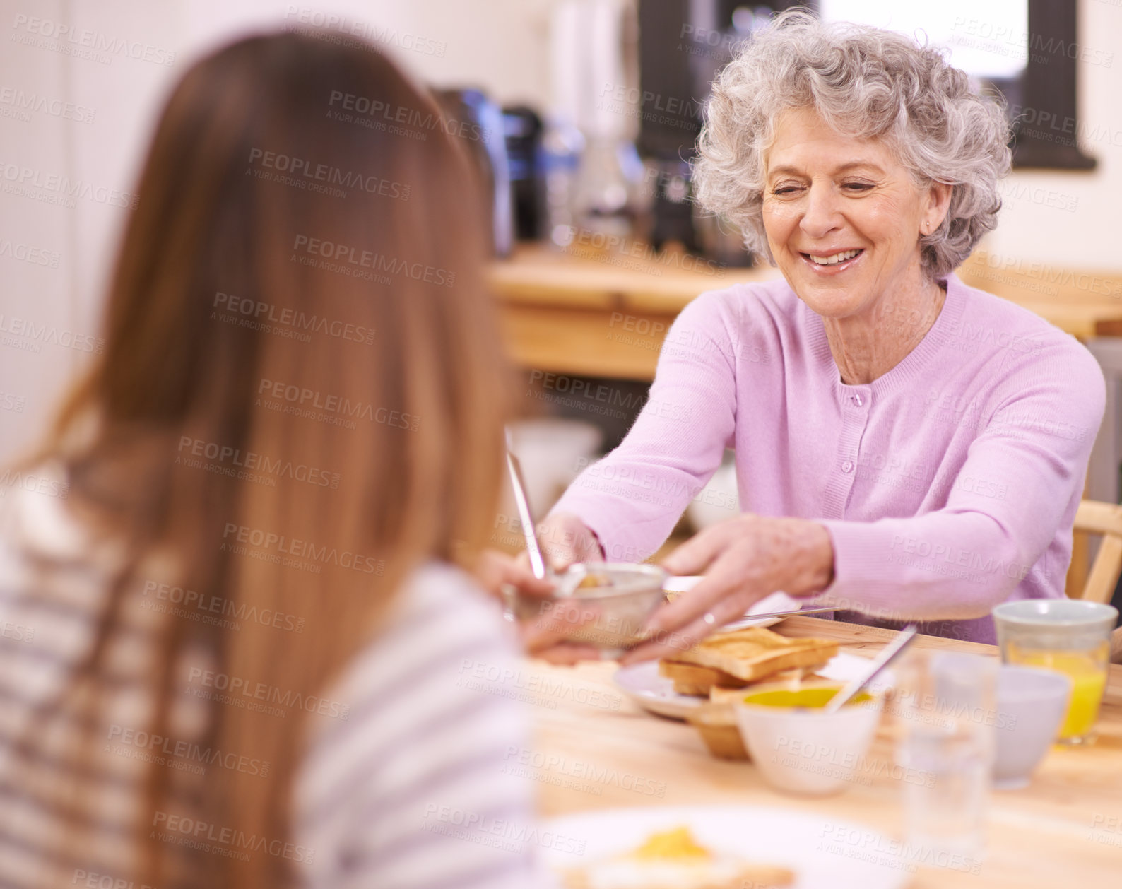 Buy stock photo Breakfast, senior and mother with food on dining table for eating with smile for healthy meal and diet. Adult, woman and elderly female person with visit from grandchild for Easter holiday in home