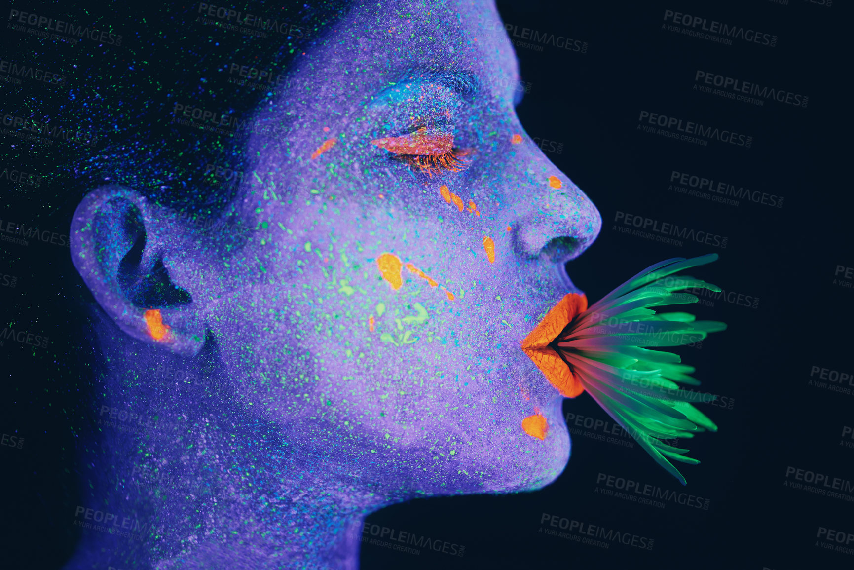 Buy stock photo Shot of a young  woman posing with neon paint on her face