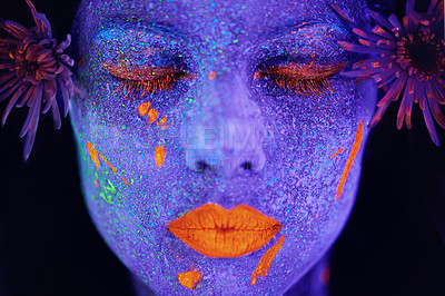 Buy stock photo Creative, face and woman with neon paint in studio for art freedom, fantasy or colorful aesthetic. Creativity, artistic and closeup of female model with facial psychedelic makeup by black background.