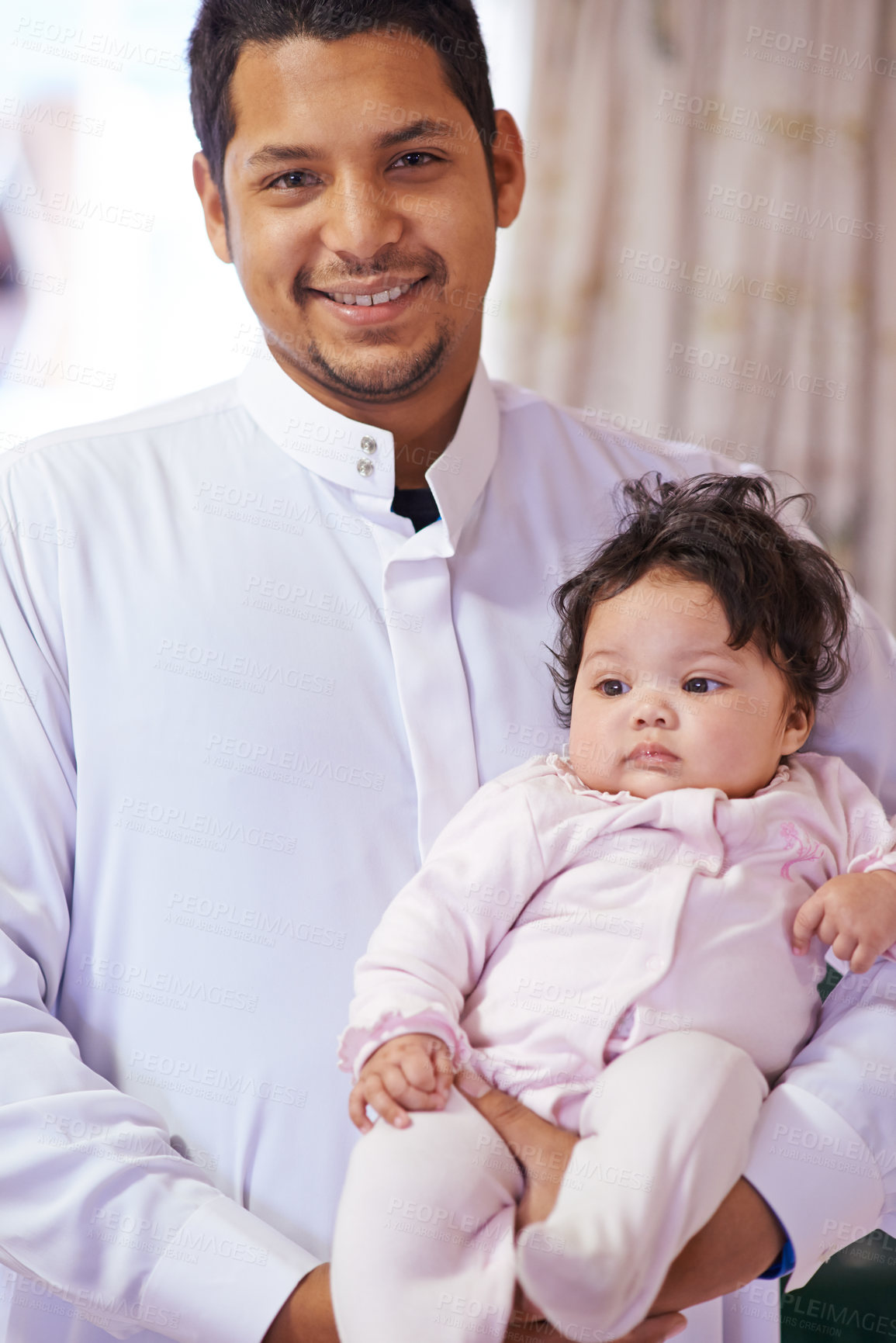 Buy stock photo Muslim, family and portrait of father with baby in home for bonding, relationship and calm together. Parenting, happy and Islamic dad with newborn infant for love, childcare or support in living room