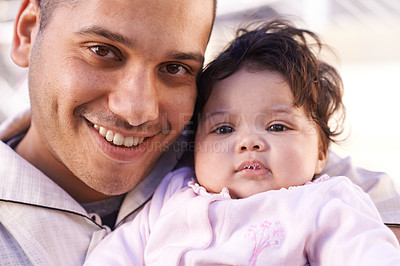 Buy stock photo Family, muslim dad and child in portrait for bonding, relationship and smile together. Islam, happy people and father with newborn infant or baby for childcare, affection and support with happiness