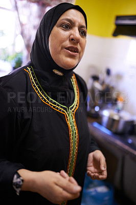 Buy stock photo Muslim woman, communication and kitchen for cooking and islam religion of halal food. Arabic, female mother and ideas with instruction on preparation of iftar, hijab and traditional meal for Ramadan