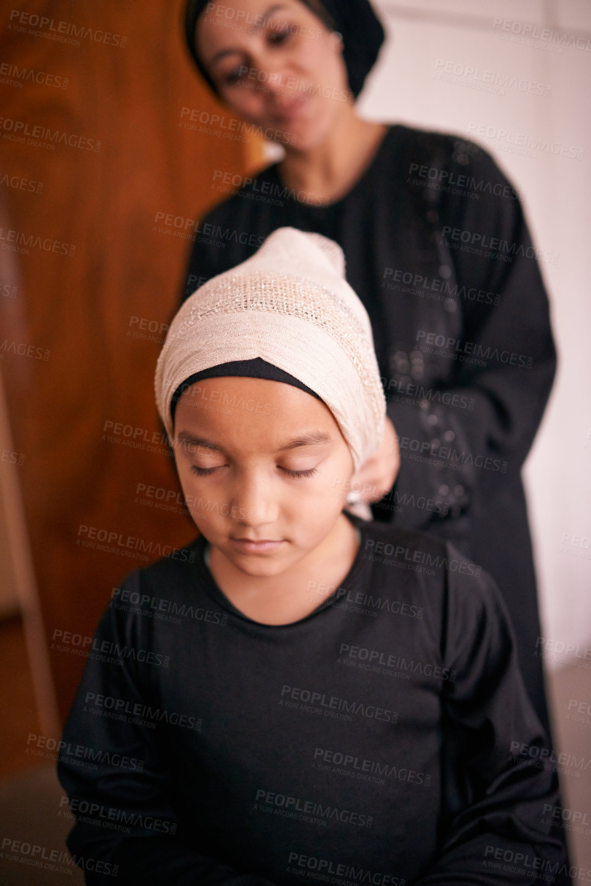 Buy stock photo Mother, child and muslim with help, hijab and support for eid celebration and culture. Islamic family, kid and bonding together for love, growth and happiness with parenting and traditional headscarf