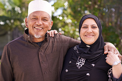 Buy stock photo Portrait of a smiling senior muslim couple outside