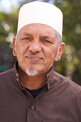 Buy stock photo Senior, muslim and portrait of man outdoor in garden to relax on calm holiday in retirement. Arab, mature person and travel on vacation in summer to park to enjoy nature and trees in backyard