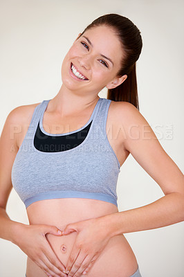 Buy stock photo Heart, hands on stomach and portrait of woman for fitness, workout and exercise to lose weight. Happy, gut health and person with shape on tummy for wellness, digestion and diet for healthy body