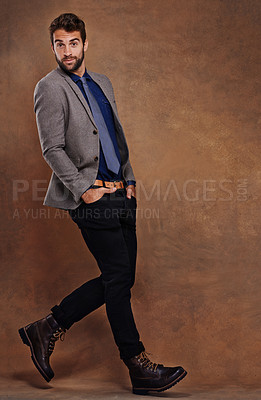 Buy stock photo Studio shot of a stylishly dressed young man