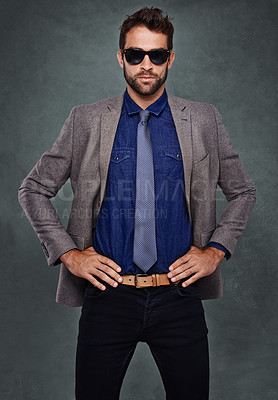 Buy stock photo Suit, fashion and portrait of man with sunglasses and confidence in studio, background and mockup. Cool, style and model with pride for professional outfit or person with luxury designer clothes