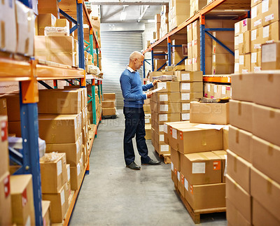 Buy stock photo Businessman, clipboard and boxes in warehouse with inventory for quality control and freight distribution. Senior manager, wholesale supplier and stock checklist in logistics industry for inspection