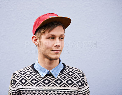 Buy stock photo Smile, fashion and happy male person, cap and trendy clothing on studio background. Face, contemporary and hat with casual outfit for handsome man model, hipster and confidence with funky style 