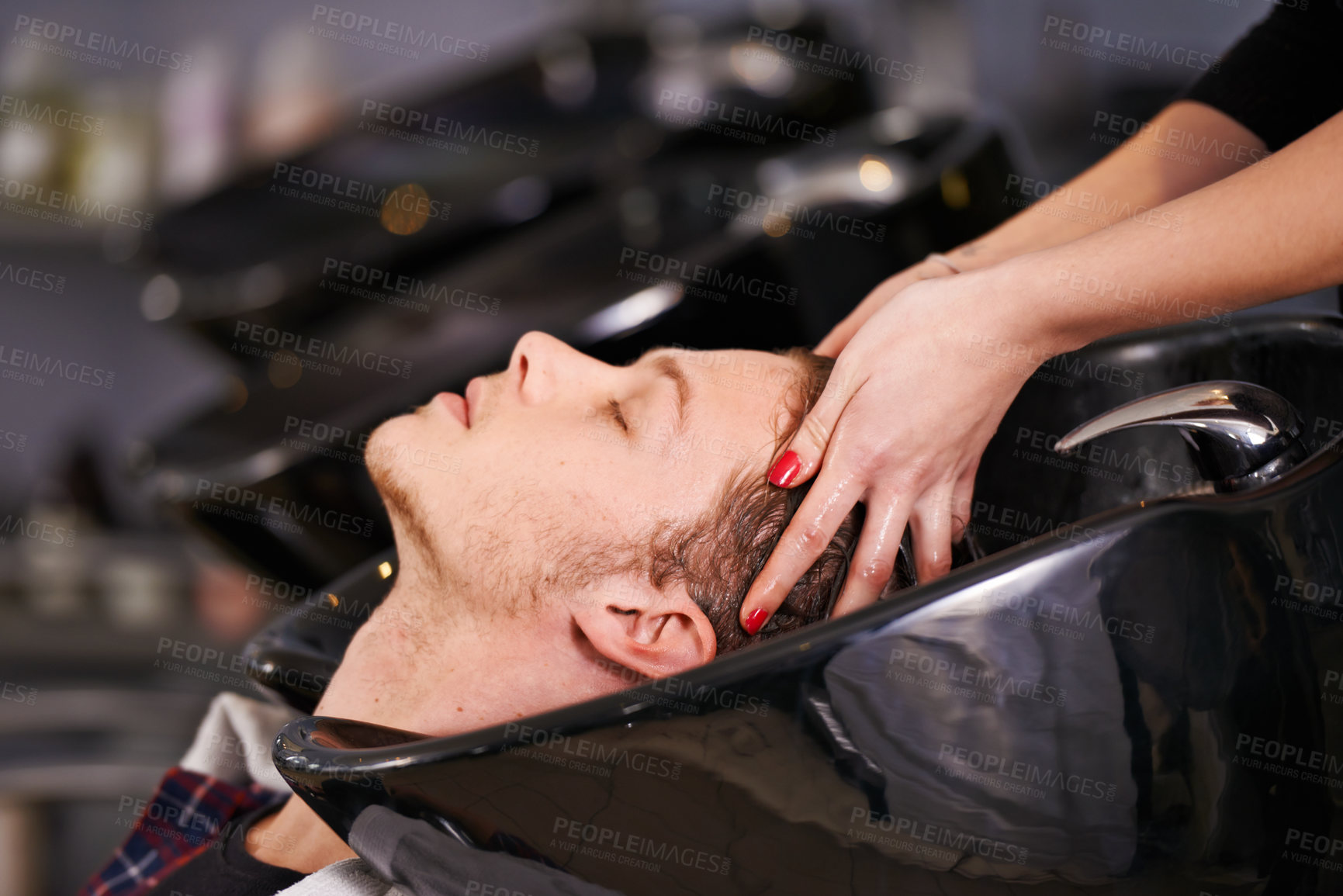 Buy stock photo Massage, washing and man at basin with hairdresser for professional haircare, cut or luxury treatment. Grooming, hair care and client at salon for shampoo, relax and small business with clean service