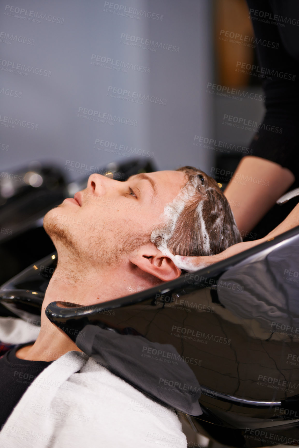 Buy stock photo Shampoo washing and man at sink with hairdresser for professional haircare, cut or luxury treatment. Grooming, hair care and client at salon with water, soap and small business with happy service