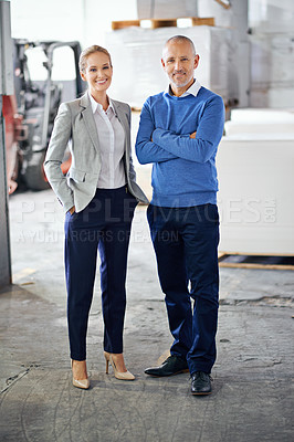 Buy stock photo Business people, man and woman in portrait at factory, confident or pride for startup project. Collaboration, creative career or designers in warehouse for printing material or distribution industry