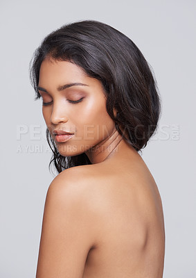 Buy stock photo Skincare, beauty and woman in studio with glow for health, wellness and natural facial routine. Confident, cosmetics and face of female person with dermatology treatment isolated by gray background.