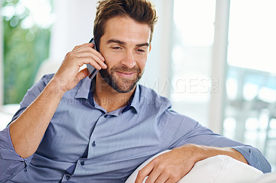 Buy stock photo Business man, phone call and speaking in home, communication and app for talking. Male person, smile and planning for project or idea in lounge, information and discussion on career opportunity