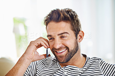 Buy stock photo Happy, man or phone call in home talking or speaking in living room for communication or chat. Smile, mobile or male person laughing in conversation to relax on couch or sofa in a house for a break 