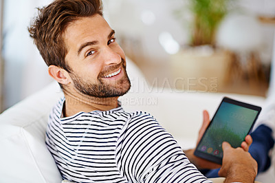 Buy stock photo Relax, portrait or man with tablet for streaming movies or watching fun videos on a film website in home. Smile, online or happy person with technology to download on app or reading ebook on couch