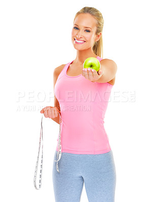 Buy stock photo White background, portrait and woman giving apple with smile for diet, healthy and wellness for body. Adult, female person and girl with fruit on hand for nutrition, breakfast and vegan in studio