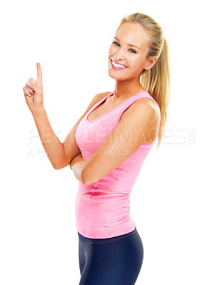 Buy stock photo Pointing, portrait and athlete with smile and happiness for fitness, health and training with workout and exercise. White background, wellness and woman with finger to show, promotion and healthy