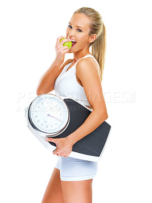 Buy stock photo Portrait, apple and scale for health or diet, exercise and workout for goals. Female person with fitness equipment for diet and weight loss with confidence for training, nutrition and happy in studio