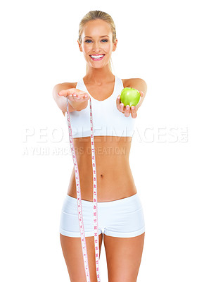 Buy stock photo Woman, smile and portrait with apple and measuring tape for detox, diet and fitness on white background. Young person, nutritionist or dietician with fruit for weight loss, health and vitamins  