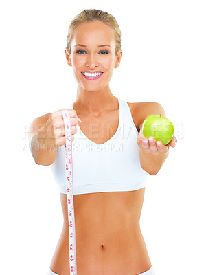 Buy stock photo Portrait, apple and happy woman with tape measure for fitness, wellness or body health in studio isolated on white background. Face, sports and person with fruit for weight loss, diet or organic food