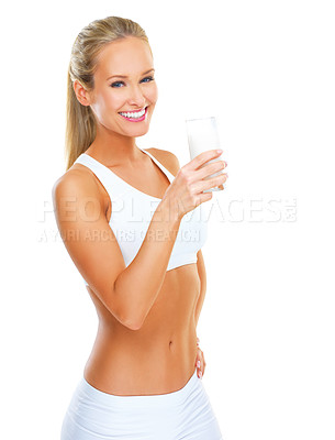 Buy stock photo Woman, portrait and water with glass in studio with smile for hydration, health and diet by white background. Girl, person and model with drink for wellness, nutrition and happy for natural detox