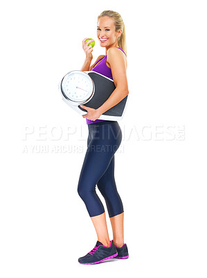 Buy stock photo Woman, scale and apple for detox, diet and fitness on white background. Young person, nutritionist or dietician and smile with fruit for weightloss, health and vitamins for exercise and workout