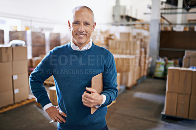 Buy stock photo Portrait of a mature man standing in a distribution warehouse