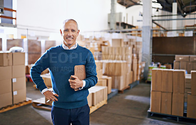 Buy stock photo Portrait of a mature man standing in a distribution warehouse