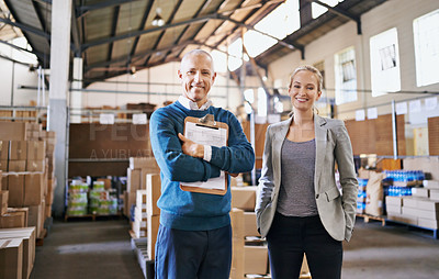 Buy stock photo Portrait of two managers standing in a distribution warehouse