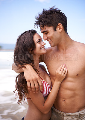 Buy stock photo Beach, hug and couple with vacation, travel and weekend break for honeymoon and getaway trip. Outdoor, seaside and embrace with man and woman with holiday, smile or love with journey, ocean or summer