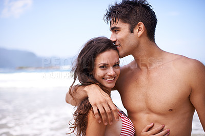 Buy stock photo Love, embrace and portrait of happy couple at ocean for tropical holiday adventure, relax and bonding together. Nature, man and woman smile on romantic date with beach, blue sky and hug on vacation.