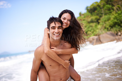 Buy stock photo Piggyback, love and portrait of couple at beach on vacation, adventure or holiday for romantic travel. Happy, smile and young man and woman on date by ocean for tropical anniversary weekend trip.