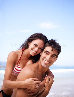 Buy stock photo Love, hug and portrait of couple at ocean for tropical holiday adventure, relax and bonding together. Nature, man and woman smile on romantic date with beach, blue sky and embrace on happy vacation.